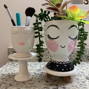 2 Face cups, planters, makeup brush holders